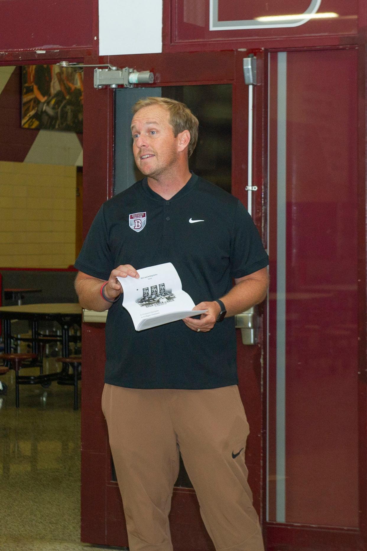 Bearden girls soccer head coach Ryan Radcliffe speaks at Bearden High School during a National Signing Day event Nov. 8, 2023.