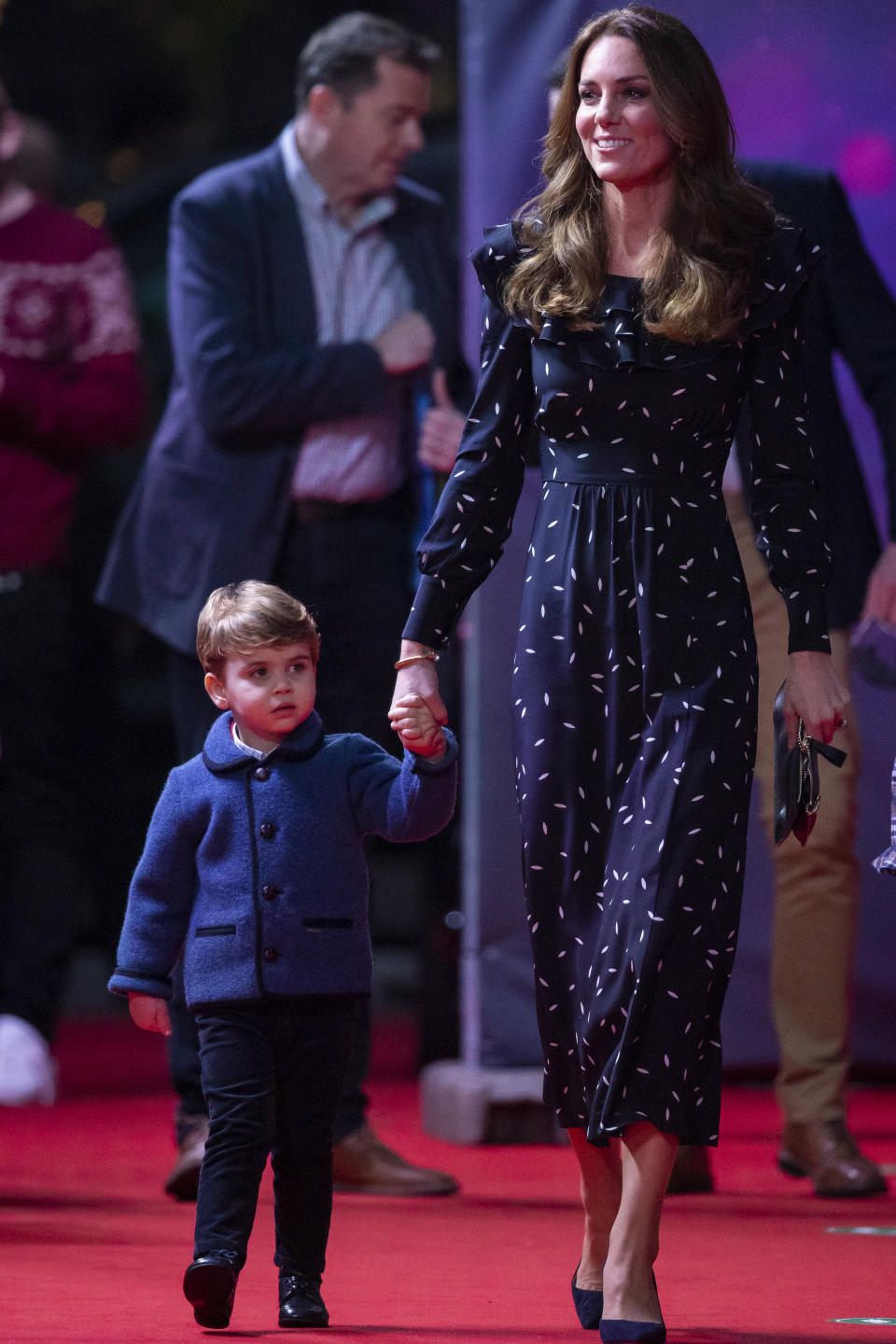 The Duchess of Cambridge with Prince Louis attend a special pantomime performance at London's Palladium Theatre, hosted by The National Lottery, to thank key workers and their families for their efforts throughout the pandemic.