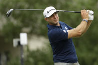 Dustin Johnson watches his tee shot on the 18th hole during the third round of the World Golf Championship-FedEx St. Jude Invitational Saturday, Aug. 1, 2020, in Memphis, Tenn. (AP Photo/Mark Humphrey)