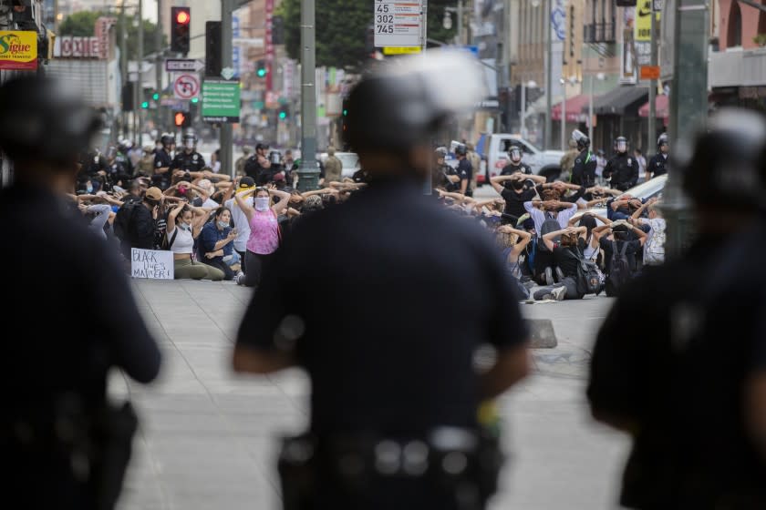 Los Angeles, CA, Tuesday, June 2, 2020 - Dozens of protesters are arrested for curfew violations on Broadway, near 5th after a long day of protesting the homicide of George Floyd. (Robert Gauthier / Los Angeles Times)