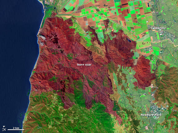 The burn scar from California's Springs Fire in early May 2013 appears in an image taken by the newest Landsat satellite on May 4.