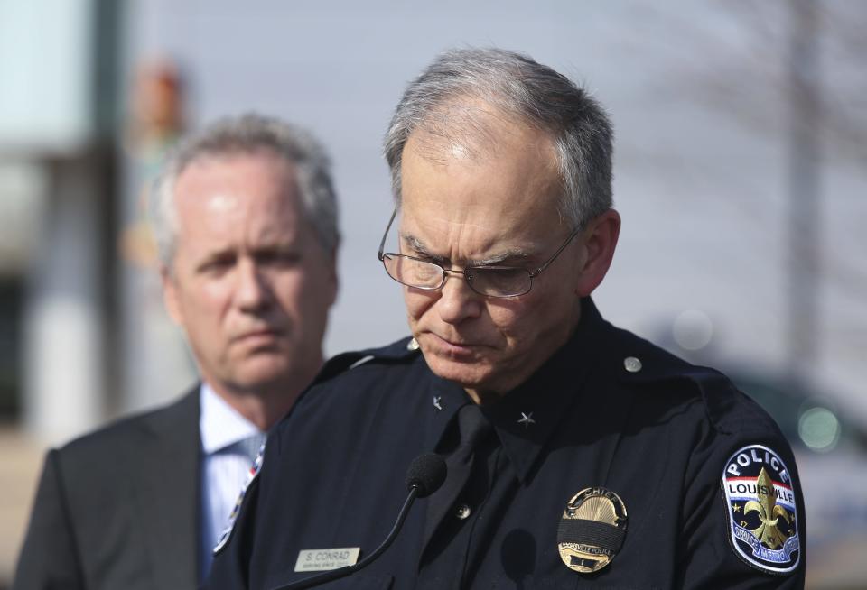 Louisville Metro Police Chief Steve Conrad, right, paused for a moment to gather himself during a statement in which he confirmed the death of LMPD Officer Nick Rodman following a car crash Tuesday night in the Portland neighborhood.  Mayor Greg Fischer was standing behind him outside the University of Louisville Hospital.
Mar. 29, 2017