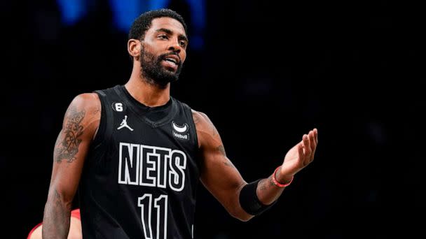 PHOTO: Brooklyn Nets guard Kyrie Irving gestures during the first half of the team's NBA basketball game against the Toronto Raptors on Friday, Dec. 2, 2022, in New York. (Eduardo Munoz Avarez/AP)