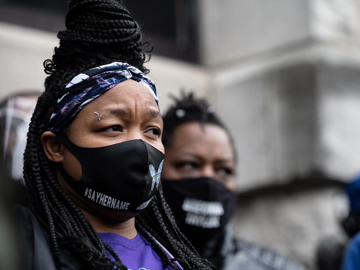 <p>Tamika Palmer listens during a press conference held in front of Commonwealth Attorney Tom Wine’s office on 11 March, 2021 in Louisville, Kentucky</p> (Getty Images)