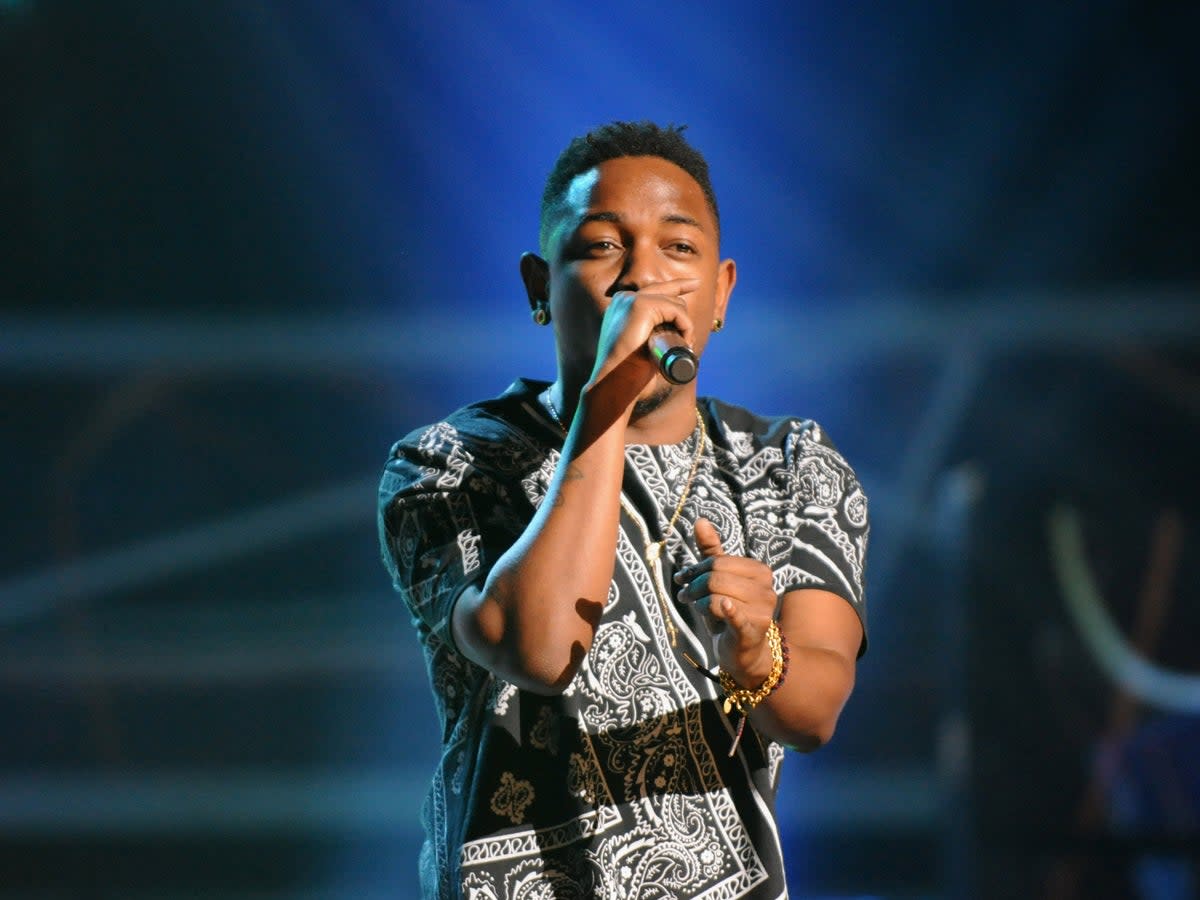 Kendrick Lamar performing at the BET Hip Hop Awards in 2012 (Getty Images for BET)