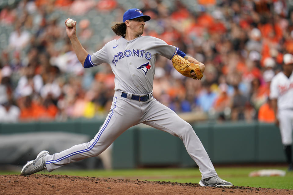 Toronto Blue Jays starting pitcher Kevin Gausman throws a pitch to the Baltimore Orioles during the third inning of the first game of a baseball doubleheader, Monday, Sept. 5, 2022, in Baltimore. (AP Photo/Julio Cortez)