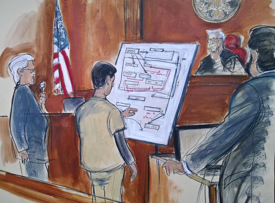 In this courtroom sketch, Judge Richard Berman, second from right, and prosecuting Assistant U.S. Attorney Sidhardha Kamaraju, far right, listen as Turkish-Iranian gold trader Reza Zarrab, second from left, explains a scheme using a diagram he drew, outlining how he helped Iran evade U.S. economic sanctions on Nov. 29, 2017, in New York. (Photo: Elizabeth Williams via AP)