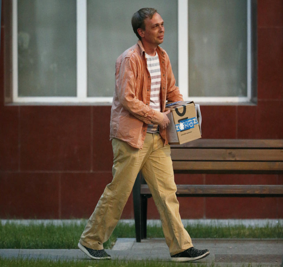 Prominent Russian investigative journalist Ivan Golunov, leaves a Investigative Committee building in Moscow, Russia, Tuesday, June 11, 2019. In a surprising turnaround, Russia's police chief on Tuesday dropped all charges against a prominent investigative reporter whose detention sparked public outrage and promised to go after the police officers who tried to frame the journalist as a drug-dealer. (AP Photo/Alexander Zemlianichenko)