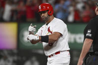 St. Louis Cardinals' Albert Pujols gestures after hitting an RBI double against the Milwaukee Brewers during the eighth inning of a baseball game Wednesday Sept. 14, 2022, in St. Louis. (AP Photo/Joe Puetz)