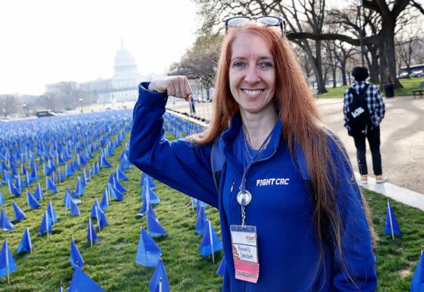 PHOTO:  Caregiver Kimberly Schoolcraft visits the United in Blue installation on the National Mall to raise awareness Of the need for more colorectal cancer research, treatment options, and funding on March 16, 2022 in Washington, D.C. (Paul Morigi/Getty Images for Fight Colorectal Cancer, FILE)