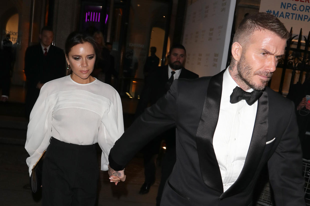 LONDON, ENGLAND - MARCH 12: David Beckham and Victoria Beckham leaving the National Portrait Gallery gala on March 12, 2019 in London, England. (Photo by Mark R. Milan/GC Images)