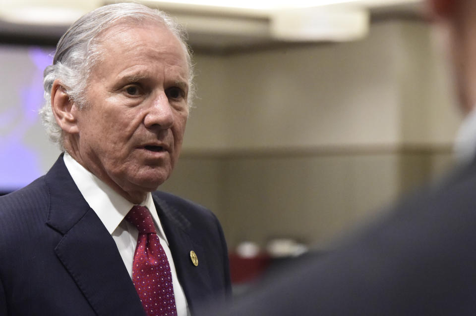FILE - South Carolina Gov. Henry McMaster speaks with reporters after the first meeting of accelerateSC, his advisory group about reopening the state economy, on Thursday, April 23, 2020, in Columbia, S.C. Some governors across the U.S., especially in Republican-leaning states, have been stressing the need for “personal responsibility” to combat the coronavirus instead of issuing statewide mandates to wear masks or avoid large social gatherings. McMaster, who has refused a statewide mask order even as confirmed cases rise swiftly and the state's rate of positive tests is three times the recommended level. (AP Photo/Meg Kinnard, file)