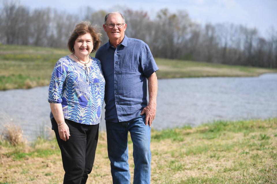 Jackson Woman of the Year Judy Renshaw poses alongside her husband Dennis on her family's property in Jackson, Tenn., on Thursday, March 14, 2024