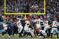 Cincinnati Bengals kicker Evan McPherson (2) kicks a 52-yard field goal against the Tennessee Titans during the second half of an NFL divisional round playoff football game, Saturday, Jan. 22, 2022, in Nashville, Tenn. The Cincinnati Bengals won 19-16. (AP Photo/Mark Humphrey)