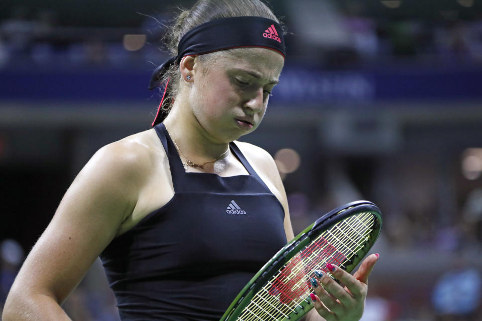 Jelena Ostapenko, of Latvia, reacts to losing a point to Maria Sharapova, of Russia, during the third round of the U.S. Open tennis tournament Saturday, Sept. 1, 2018, in New York. (AP Photo/Adam Hunger)