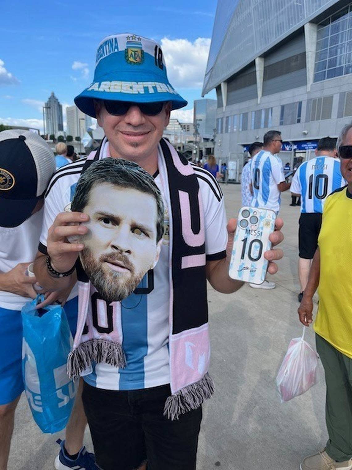 Alexi Macias of Port St. Lucie, Florida, an Inter Miami season holder and diehard Argentina fan, wore a Lionel Messi hat, shirt, mask and tattoo on his left calf, and carried a Messi cell phone case to the Copa America opener vs. Canada at Mercedes-Benz Stadium in Atlanta on June 20, 2024.