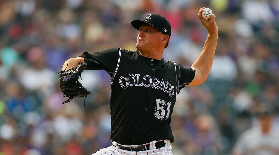 Rockies reportedly bring back lefty Jake McGee on a three-year deal. (AP)