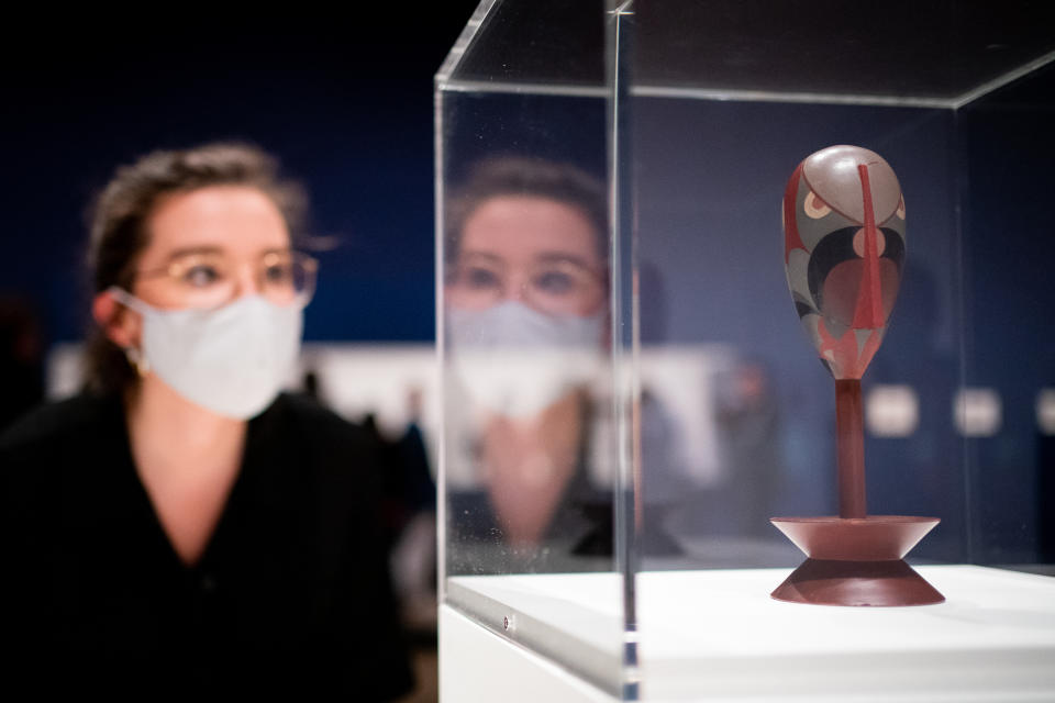 <p>A person views 'Portrait H[ans] A]rp] 1918 Oil paint on wood during a photo call for the new Sophie Taeuber-Arp exhibition at the Tate Modern in London. Picture date: Tuesday July 13, 2021.</p>
