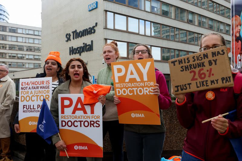 Junior and senior doctors in England take part in a joint strike action for the first time in pay dispute