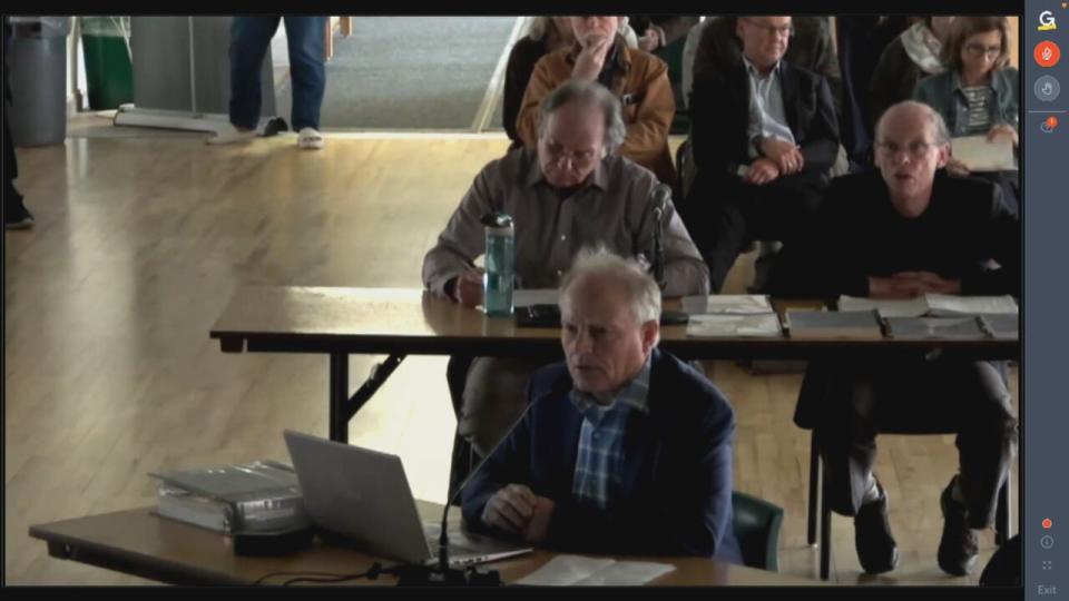 At a Nova Scotia Aquaculture Review Board hearing, Ernie Porter (centre) said he believes his oyster farm can exist in harmony with other users of Antigonish Harbour. 