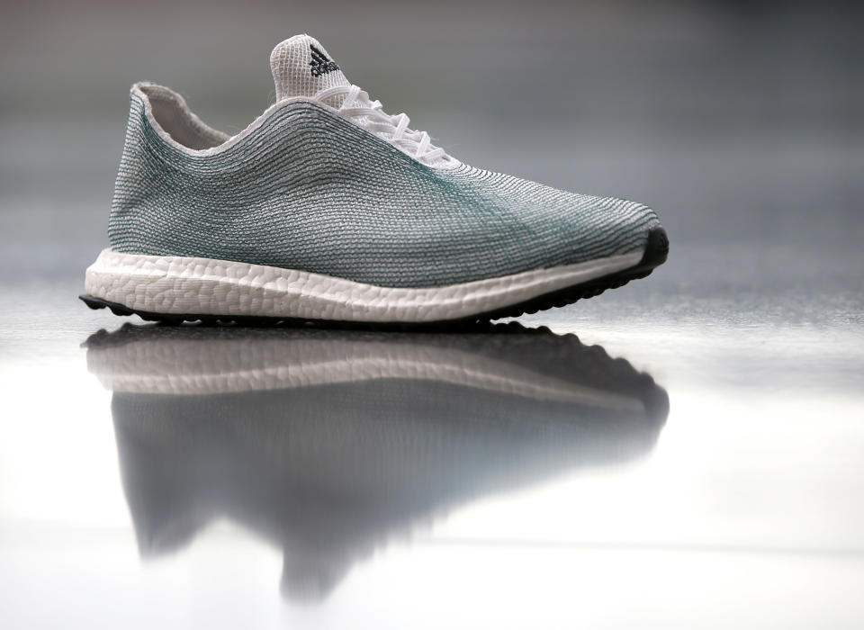 An Adidas shoe made from recycled ocean plastic. (Photo: Michaela Rehle / Reuters)