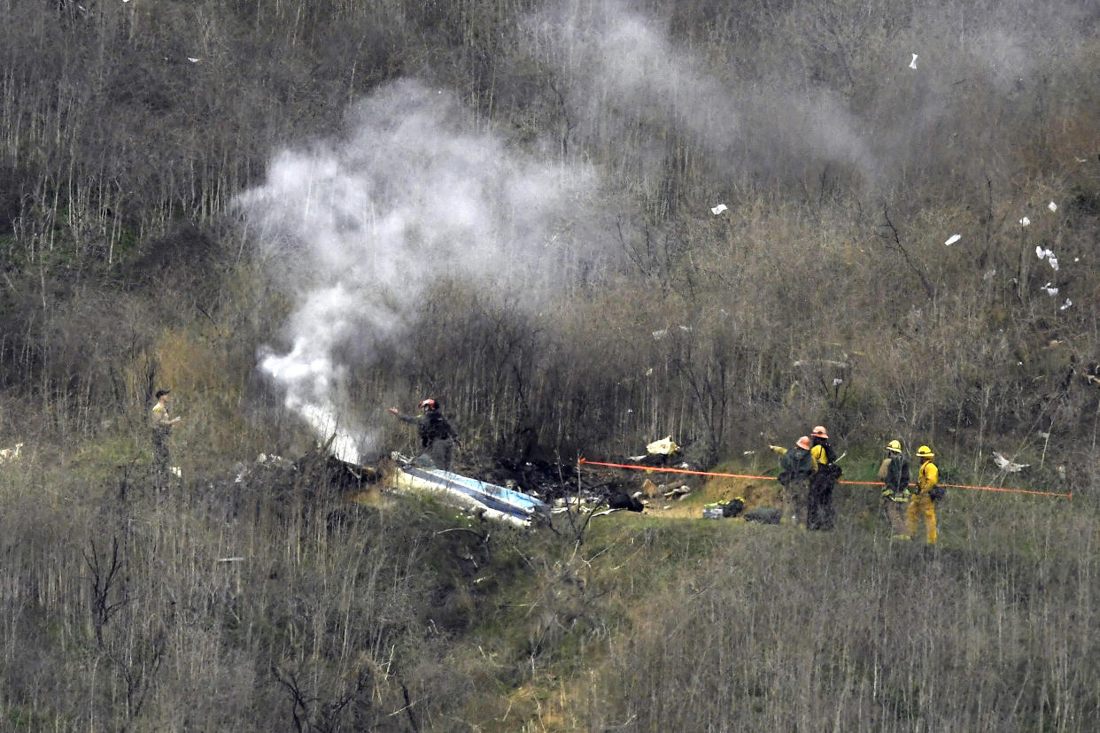 Image: Emergency personnel at scene of Kobe Bryant crash (Mark J. Terrill / AP file)