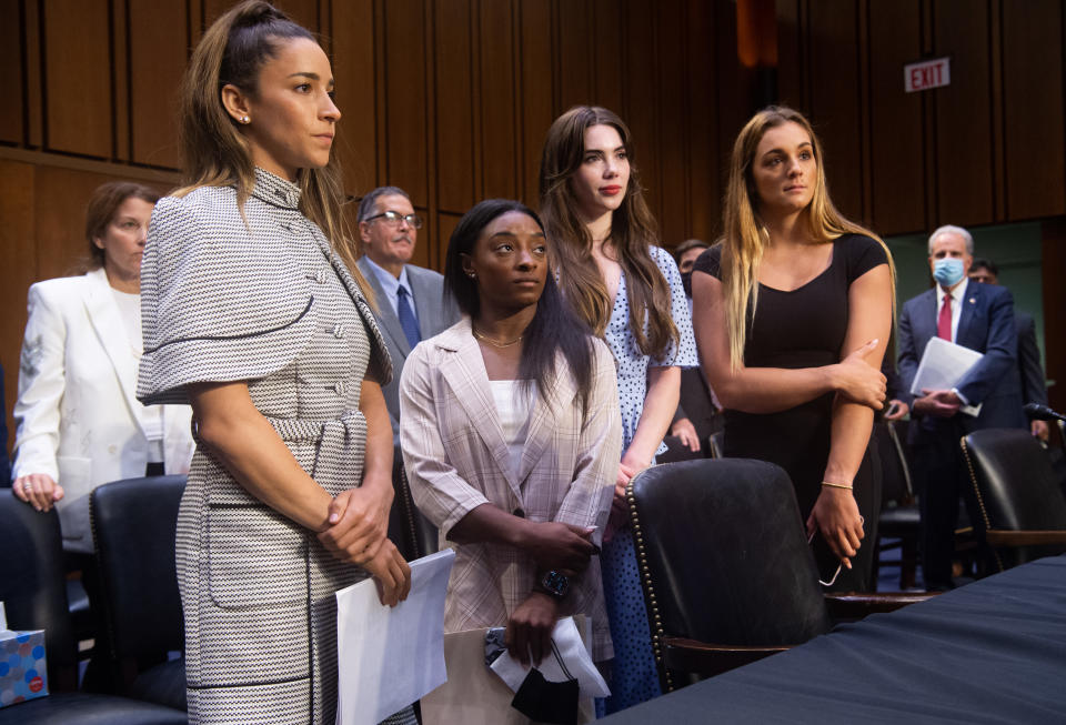 U.S. Olympic gymnasts Aly Raisman, Simone Biles, McKayla Maroney and NCAA and world champion gymnast Maggie Nichols leave after testifying during a Senate Judiciary hearing about the Inspector General’s report on the FBI handling of the Larry Nassar investigation of sexual abuse of U.S. gymnasts, on Capitol Hill, September 15, 2021 in Washington, DC. - Credit: Saul Loeb - Pool/Getty Images