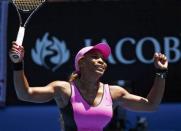 Serena Williams of the U.S. celebrates defeating Daniela Hantuchova of Slovakia in their women's singles match at the Australian Open 2014 tennis tournament in Melbourne January 17, 2014. REUTERS/Petar Kujundzic