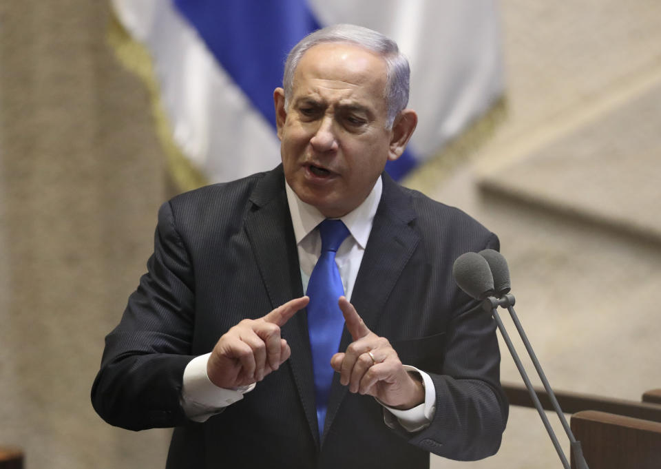 Israel's outgoing prime minister Benjamin Netanyahu speaks during a Knesset session in Jerusalem Sunday, June 13, 2021. Bennett is expected later Sunday to be sworn in as the country's new prime minister, ending Prime Minister Benjamin Netanyahu's 12-year rule. (AP Photo/Ariel Schali22