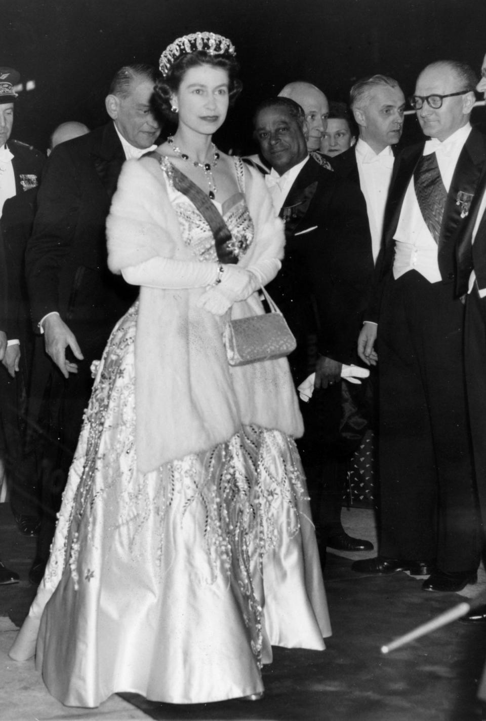 The dress, designed by Norman Hartnell for the Queen in 195, is also in the archive (Popperfoto via Getty Images)
