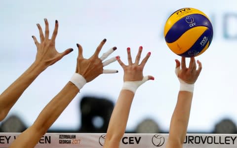 No wonder those volleyball players look so pleased with themselves - Credit: SERGEI ILNITSKY/EPA