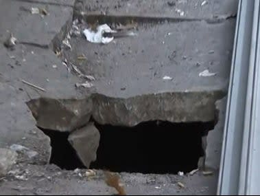 The hole in the Bronx pavement that Leonard Shoulders fell down on Saturday 24 October 2020 ((CBS New York))