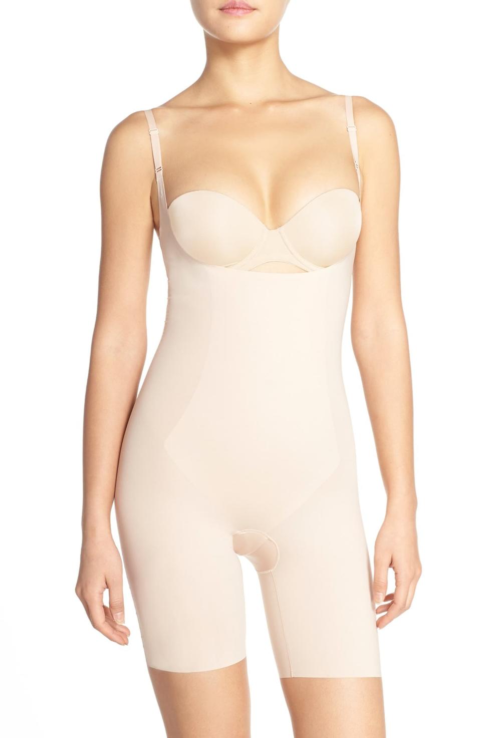 Spanx Thinstincts Open Bust Mid Thigh Bodysuit. Image via Nordstrom.