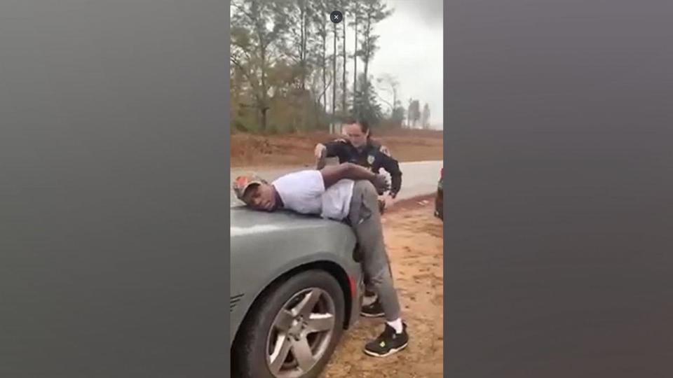 PHOTO: Cell phone video shows the arrest of Micah Washington by an Alabama police officer on Dec. 2, 2023. (Maxwell and Tillman)