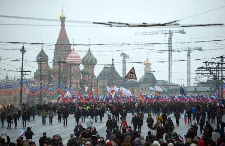 Russian opposition supporters march in memory of murdered Kremlin critic Boris Nemtsov in central Moscow on March 1, 2015