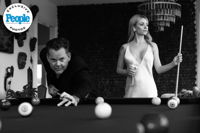 <p>Christy Dux Portraits</p> Gary Allan and wife Molly Martin play pool on their wedding day