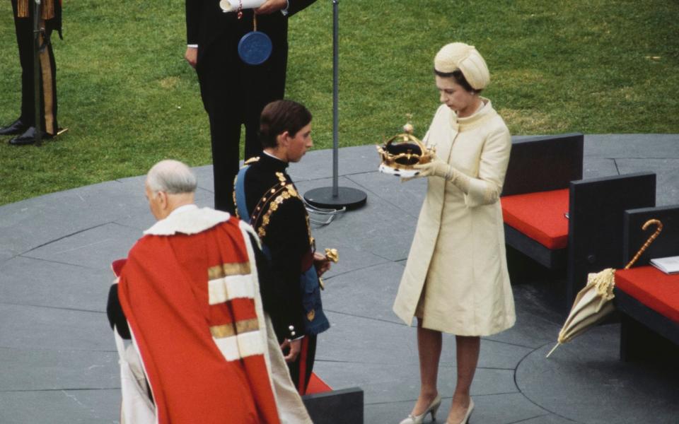 The late Queen carries Simone Prince Charles' investiture as Prince of Wales in 1969