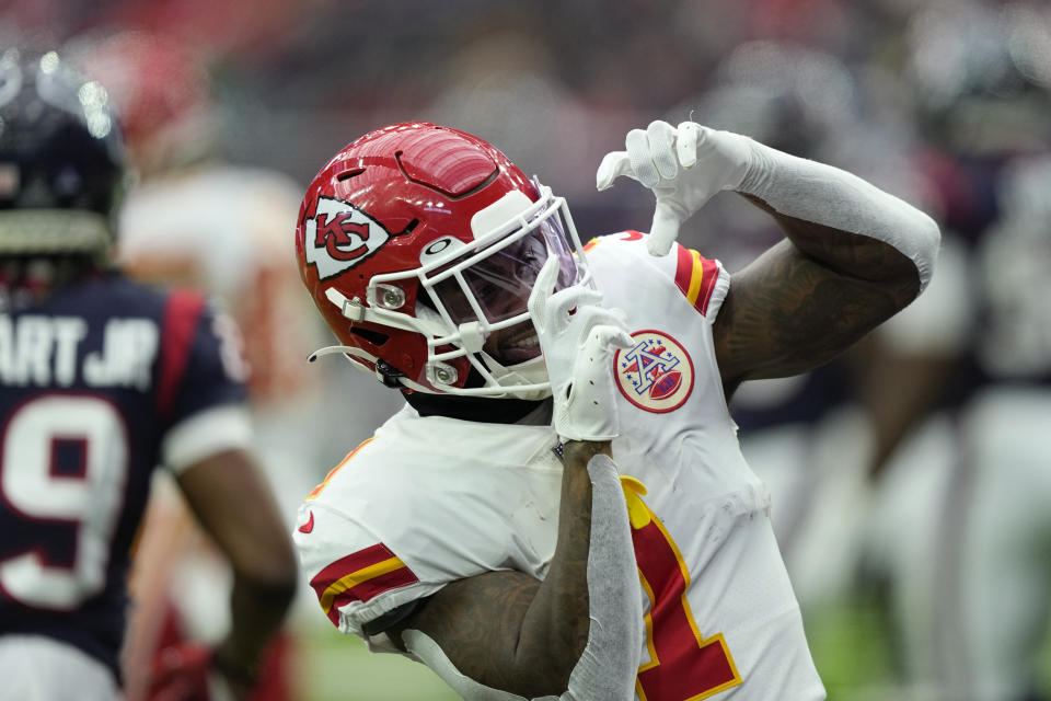 Kansas City Chiefs running back Jerick McKinnon (1) celebrates his touchdown against the Houston Texans during the first half of an NFL football game Sunday, Dec. 18, 2022, in Houston. (AP Photo/David J. Phillip)