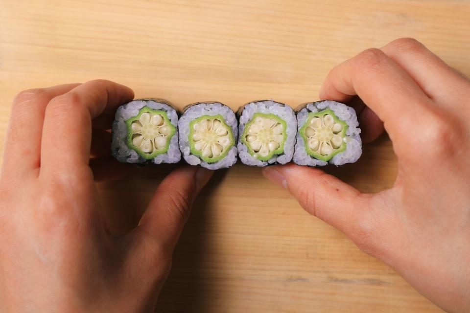 Overhead shot of sushi with okra at the center.