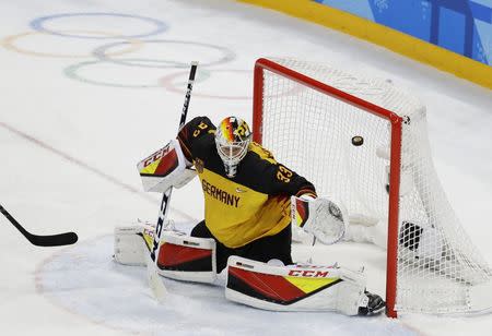 Ice Hockey - Pyeongchang 2018 Winter Olympics - Men's Final Game - Olympic Athletes from Russia v Germany - Gangneung Hockey Centre, Gangneung, South Korea - February 25, 2018 - Goaltender Danny Aus Den Birken of Germany lets in a goal from Kirill Kaprizov, an Olympic Athlete from Russia, in overtime. REUTERS/David W Cerny