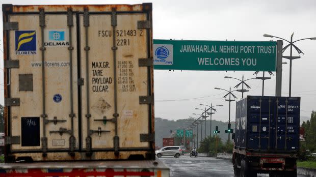 An image of trucks carrying containers enter JNPT on the outskirts of Mumbai