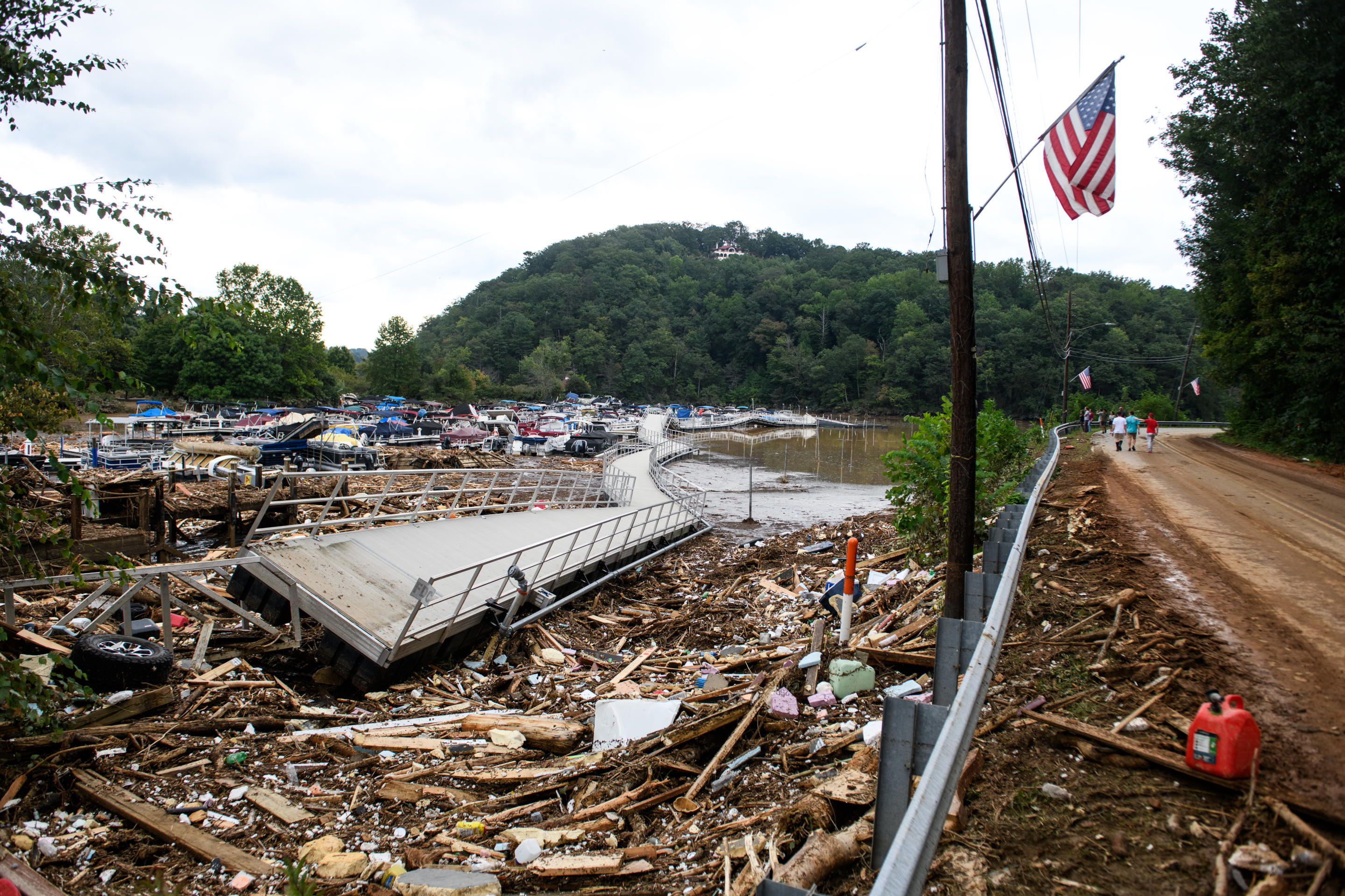 Debris covers a vast area near the Broad River in the village of Chimney Rock, North Carolina