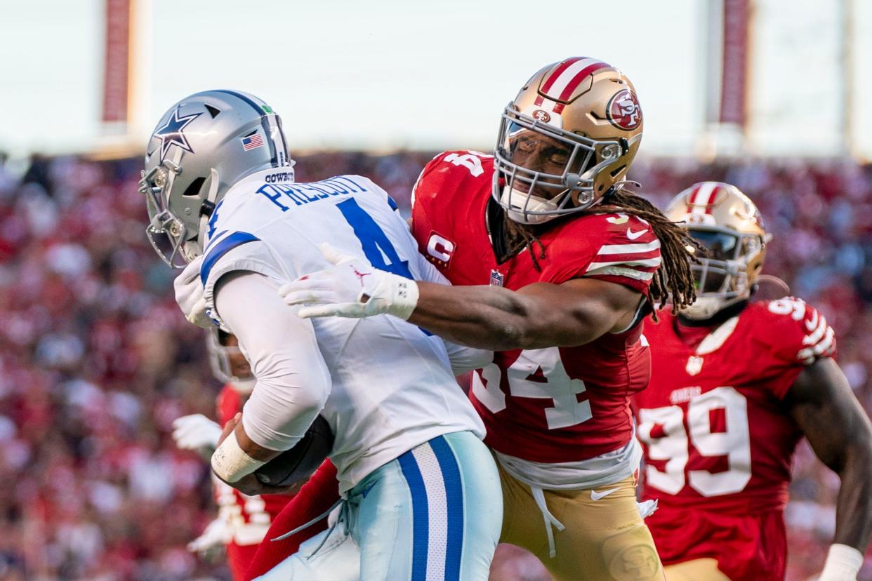 San Francisco 49ers linebacker Fred Warner (54) sacks Dallas Cowboys quarterback Dak Prescott.