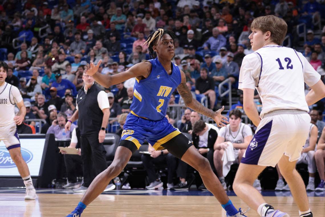 Kenneth Lewis of Houston Washington defends against Boerne’s Barrett Pape in a Class 4A state semifinal on Friday, March 10, 2023 at the Alamodome in San Antonio, Texas.