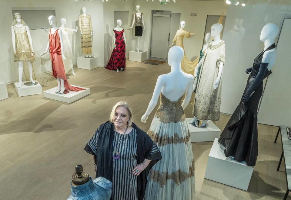 Paquita Parodi, collector and restorer of antique dresses, founded Parodi Costume Collection in Miami, where she exhibits her more than 5,000 pieces and hosts fashion design students in a restored house in Wynwood. Parodi poses next to a 1958 dress designed by Fernanda Gattinoni, worn by actress Sofia Loren, and another from the “Flamenco” series, by Spanish designer Cristóbal Balenciaga, worn by Dolores del Río.