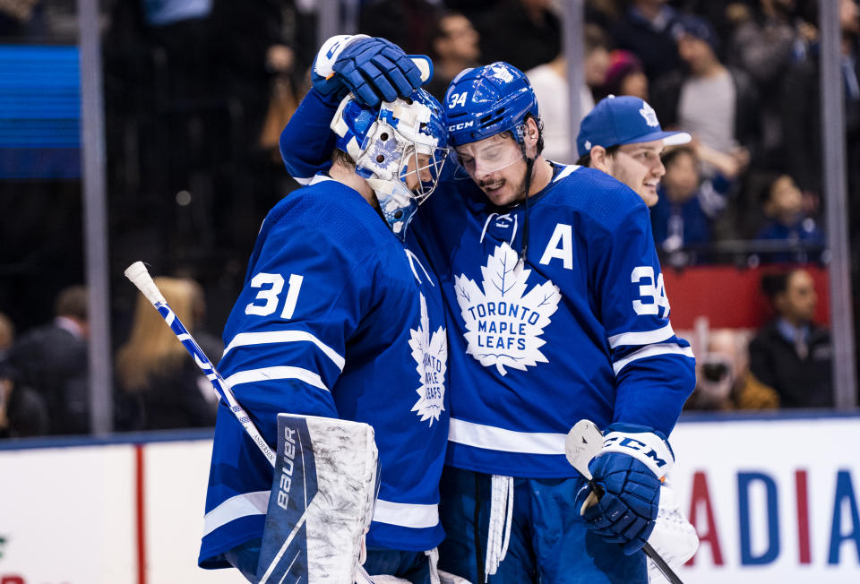 TORONTO, ON - DECEMBER 17: Frederik Andersen #31 of the Toronto Maple Leafs celebrates with teammate Auston Matthews #34 after defeating the Buffalo Sabres at the Scotiabank Arena on December 17, 2019 in Toronto, Ontario, Canada. (Photo by Kevin Sousa/NHLI via Getty Images)