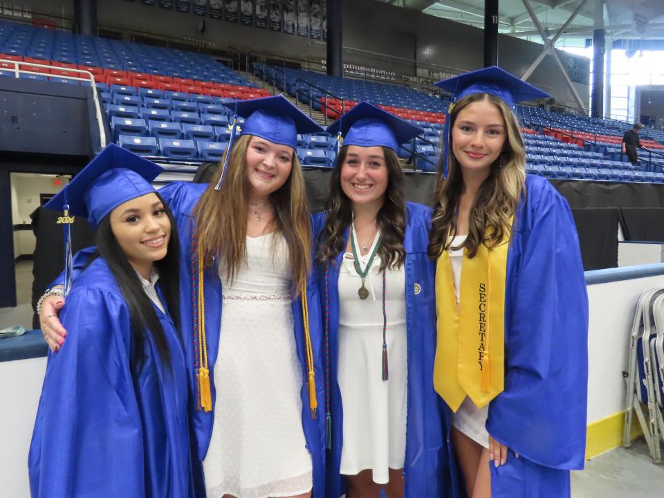 Ahmiyah Cook, Ella Parr, Riley Barton and Audrey LaBelle waiting for the Somersworth High School graduation ceremony to begin on Friday, June 7, 2024 at the Whittemore Center in Durham.