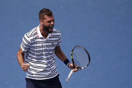 Aug 31, 2015; New York, NY, USA; Benoit Paire of France reacts after winning a point against Kei Nishikori of Japan (not pictured) on day one of the 2015 U.S. Open tennis tournament at USTA Billie Jean King National Tennis Center. Paire won 6-4, 3-6, 4-6, 7-6 (6), 6-4. Mandatory Credit: Geoff Burke-USA TODAY Sports
