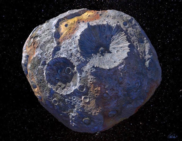 An artist's conception of the asteroid 16 Psyche, one of the most massive objects in the main asteroid belt orbiting between Mars and Jupiter. The asteroid could be made entirely of metal, according to a new study published this week.
