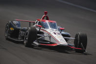 Will Power, of Australia, drives into Turn 2 during qualifying for the Indianapolis 500 auto race at Indianapolis Motor Speedway in Indianapolis, Sunday, May 19, 2024. (AP Photo/Michael Conroy)